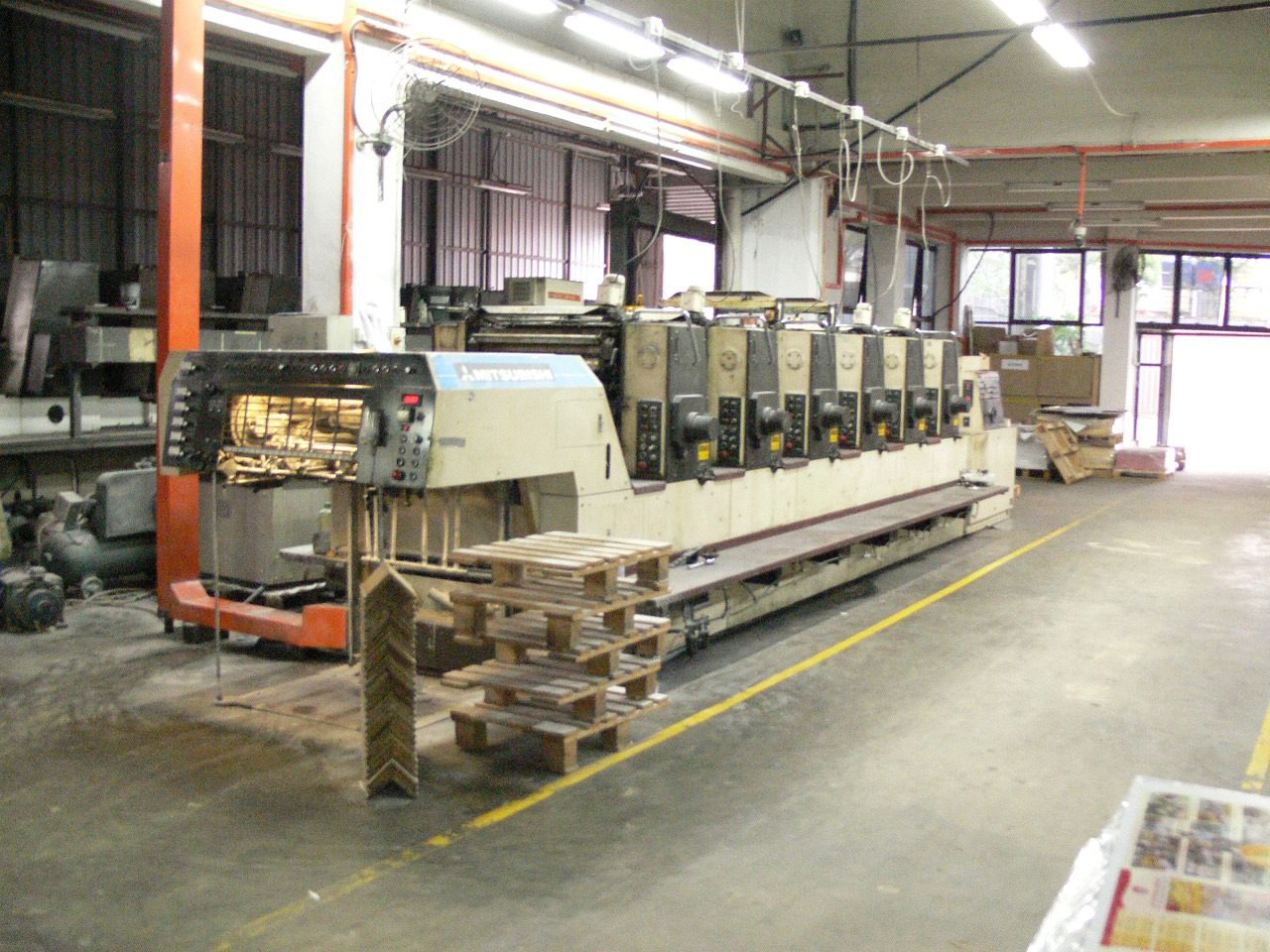 The Mitsubishi six-colour offset press line on the FirstPack factory floor