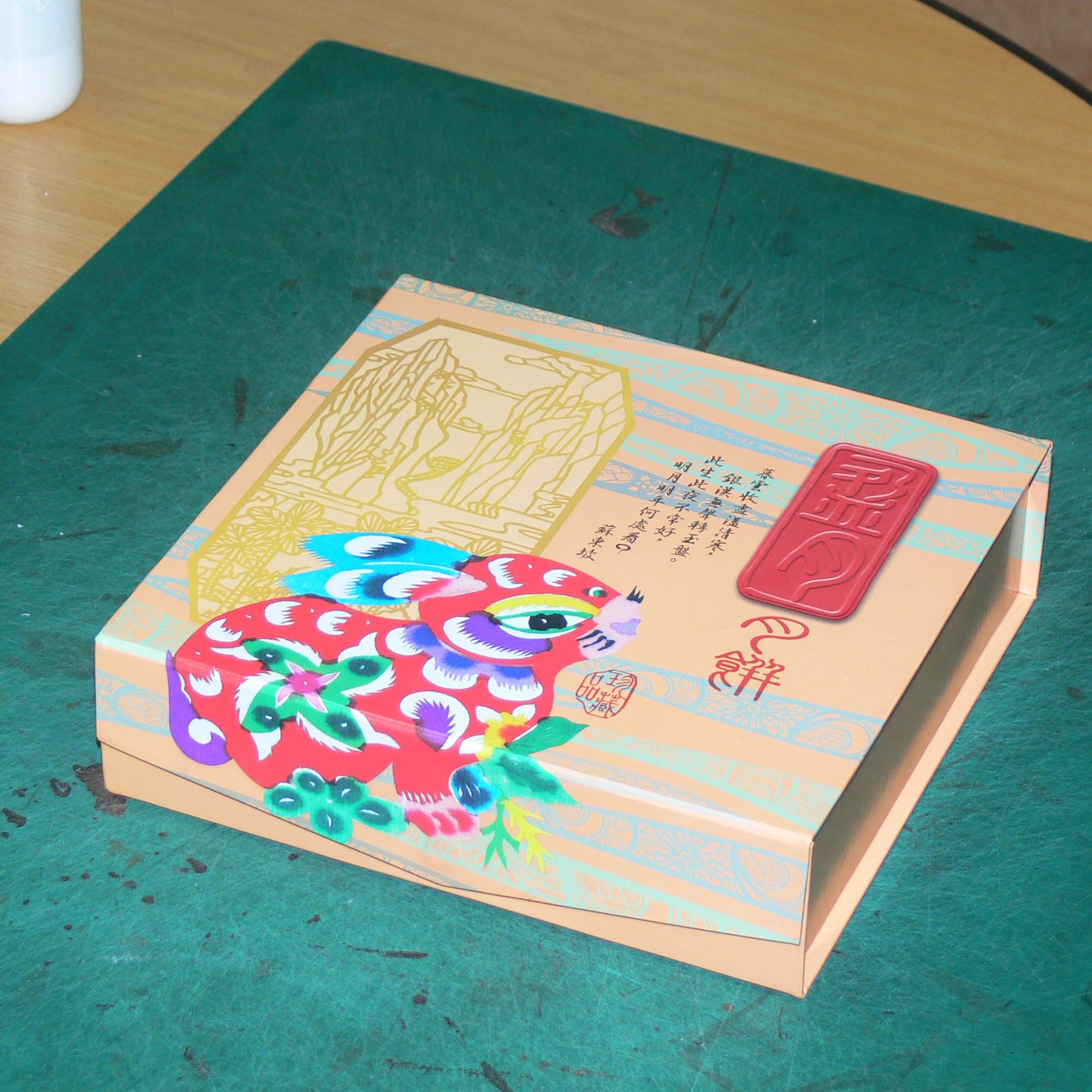 Folk-art mooncake gift box, editorial festive styling